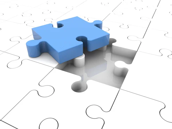 Concept met puzzelstukjes in blauw en wit — Stockfoto