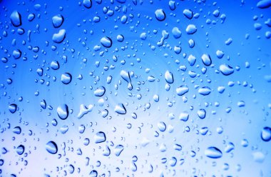 Damla su ile mavi arka plan