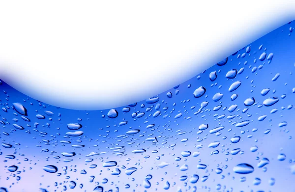 Fundo azul com gota de água — Fotografia de Stock