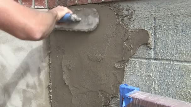 Stucco toepassing op muur — Stockvideo