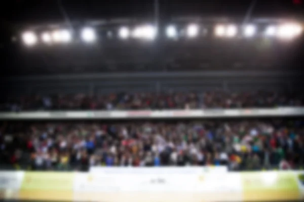 Blurred background of basketball players in court