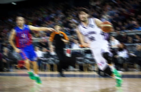 Fundo borrado de jogadores de basquete na corte — Fotografia de Stock