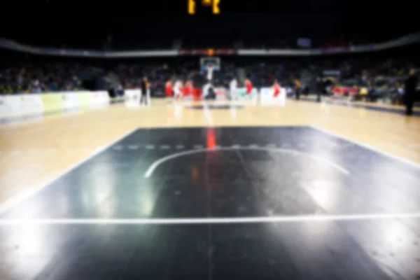 Fondo borroso de los jugadores de baloncesto en la corte — Foto de Stock