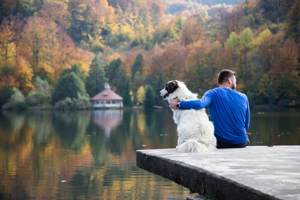 Man Dog Sitting Autumn Lake Social Distancing — Stock Photo, Image