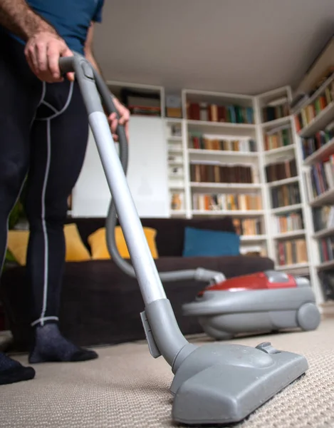 Man Vacuum Cleaning Home — Stock Photo, Image