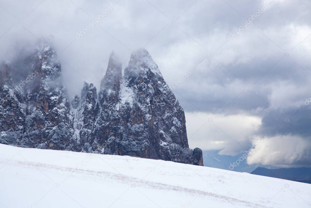 snowy early winter landscape in Alpe di Siusi.  Dolomites,  Italy - winter holidays destination 