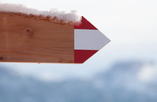 Stock image fresh snow on wooden signboard