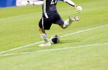 Futbol oyuncularının futbol için savaştığı pankart