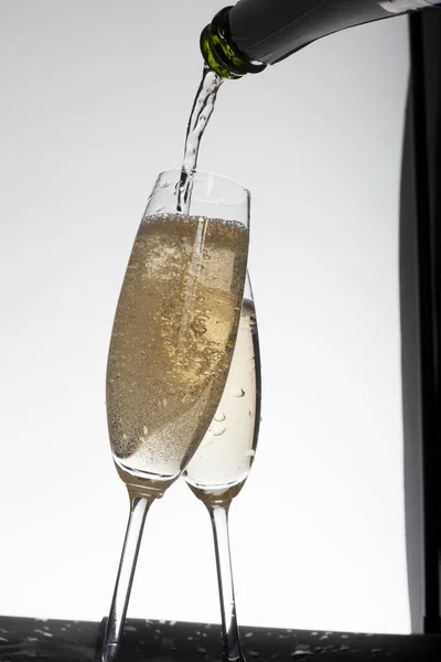 Pouring Champagne Glasses Light Background — Stock Photo, Image
