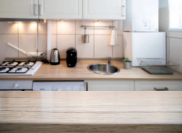 blurred kitchen interior and desk space