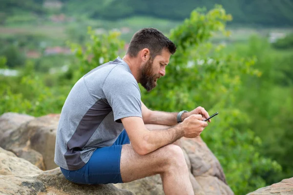 Handsome Man Sitting Rock Green Summer Scenery — Stock Photo, Image
