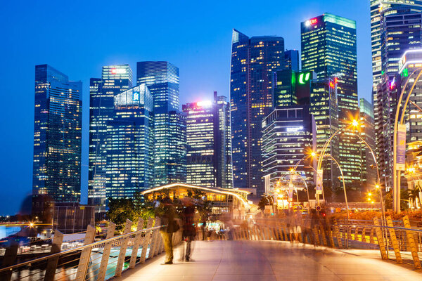 SINGAPORE, SINGAPORE - MARCH 2019: Vibrant Singapore skyline at night
