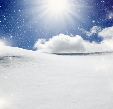 Background of cold winter landscape with snow, blue sky and sunl clipart