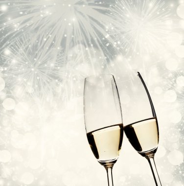 Toasting with champagne glasses on sparkling holiday background clipart