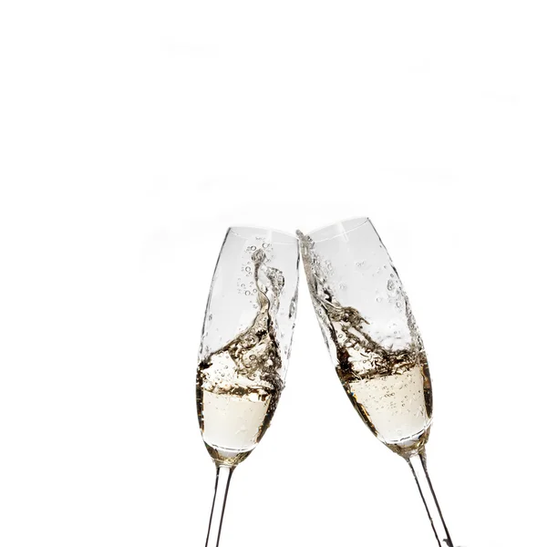 Toasting with champagne glasses on white background — Stock Photo, Image