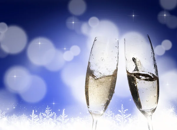 Toasting with champagne glasses on sparkling holiday background — Stock Photo, Image