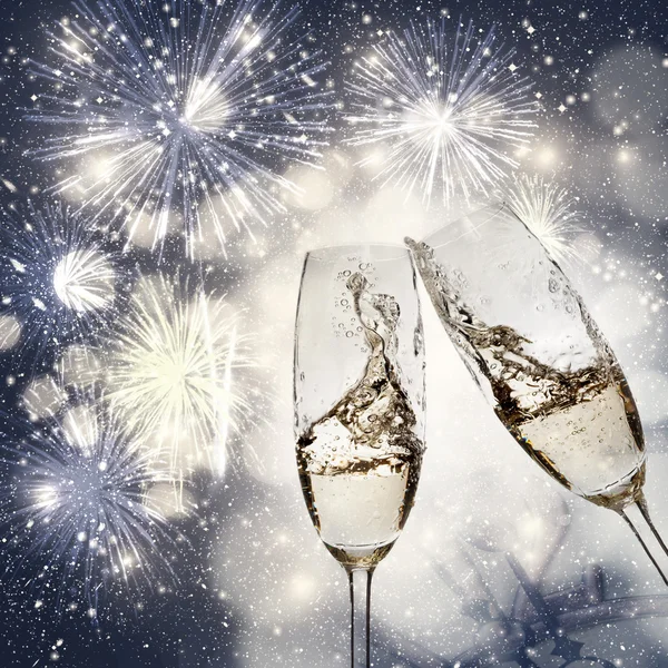 Toasting with champagne glasses on sparkling holiday background — Stock Photo, Image