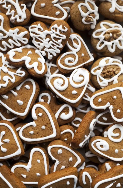 Christmas homemade gingerbread cookies over wooden table — Stock Photo, Image