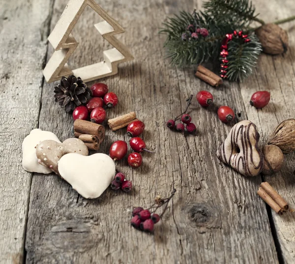 Christmas decorations on rustic wooden background — Stock Photo, Image