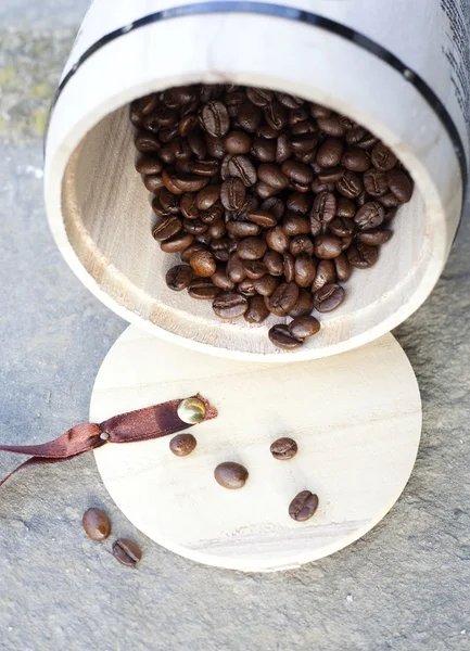 Coffee beans in wooden bowl — Stock Photo, Image