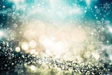 Noel ışıkları bulanık bokeh. Sihirli tatil soyut glitter arka plan yıldızlar yanıp sönen ve kar taneleri düşüyor.