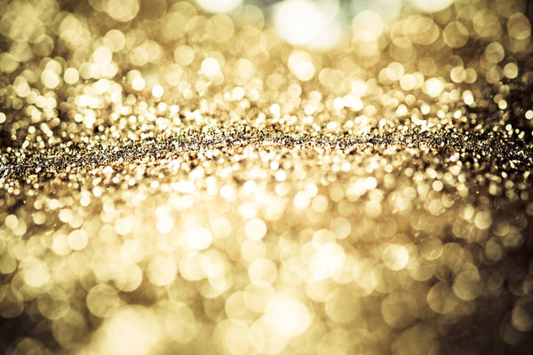 абстрактный рождественский фон с праздничными огнями и копировальным пространством - волшебный боке-блеск с мерцающими звездами и падающими снежинками
