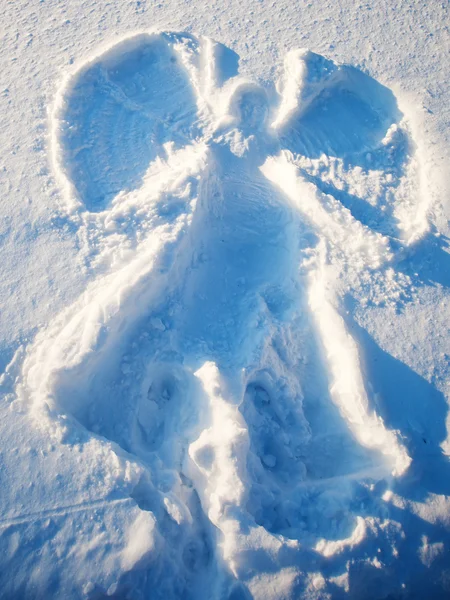 Snow angel - téli ünnepek koncepció — Stock Fotó