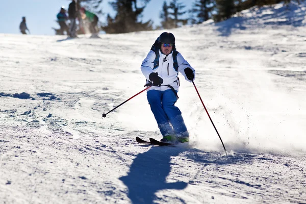 Man skiing on slope - winter holidays — Stock Photo, Image