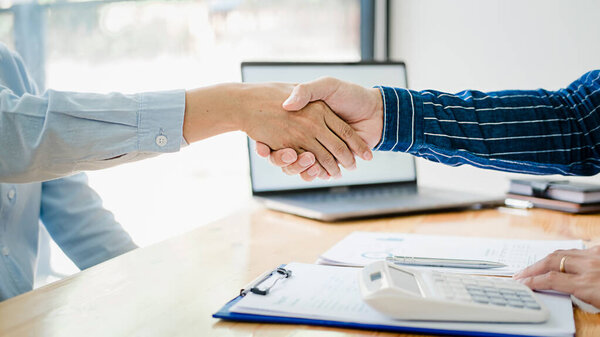 Business confident handshake and business people after discussing , success  concept