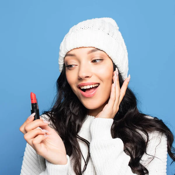 Happy Brunette Woman Hat Looking Lipstick Isolated Blue — Stok Foto