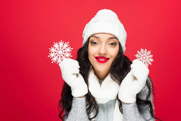 Pleased Woman Winter Outfit Holding Decorative Snowflakes Isolated Red — Stock Photo, Image