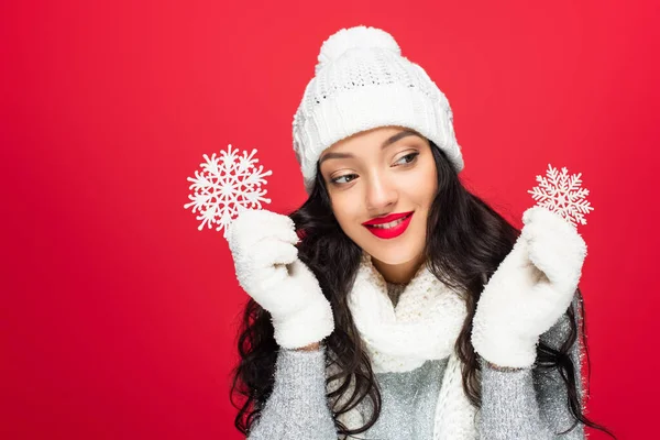 Joyful Woman Winter Outfit Holding Decorative Snowflakes Isolated Red — Stock Photo, Image