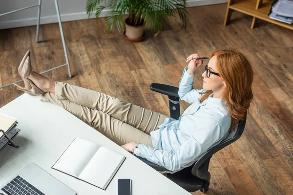 Overhead View Redhead Businesswoman Crossed Legs Sitting Workplace Digital Devices — Stock Photo, Image