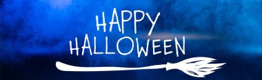 happy halloween lettering on blue dark background with smoke, banner clipart