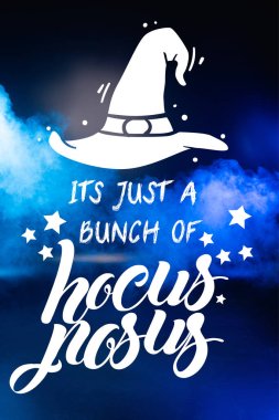 it is just bunch of hocus pocus lettering on blue dark background with smoke clipart