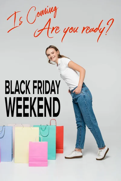 Joyful Woman Standing Hands Pockets Shopping Bags Black Friday Weekend — Stock Photo, Image
