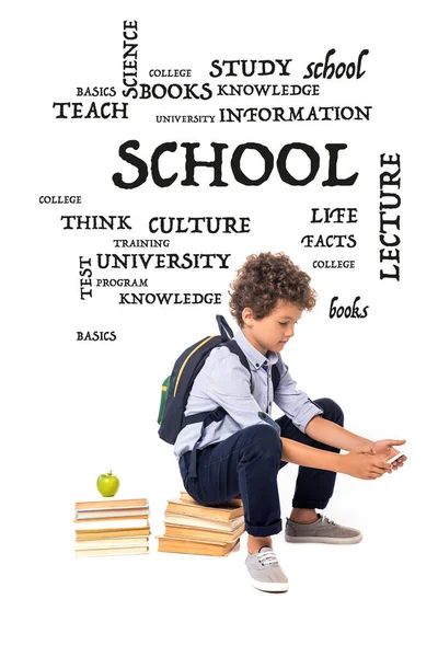 Curly Schoolboy Backpack Sitting Books Apple Lettering While Using Smartphone — Stock Photo, Image