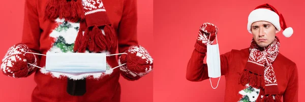 Kolaż Smutnego Człowieka Czapce Rękawiczkach Mikołaja Maską Medyczną Odizolowaną Czerwono — Zdjęcie stockowe