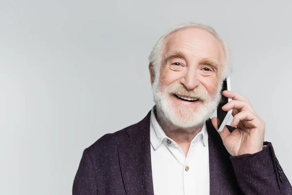 Smiling Elderly Man Talking Smartphone Isolated Grey — Stock Photo, Image