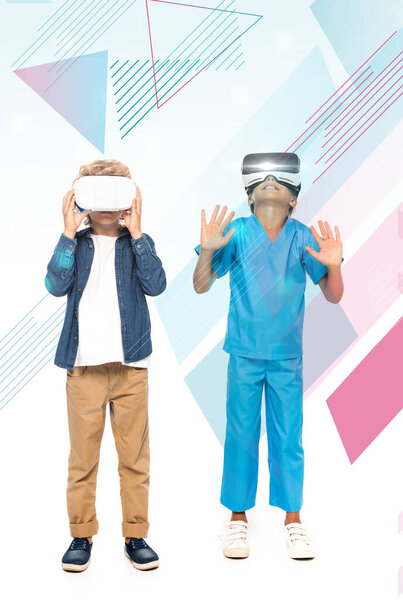 boy touching virtual reality headset while kid gesturing near illustration on white 