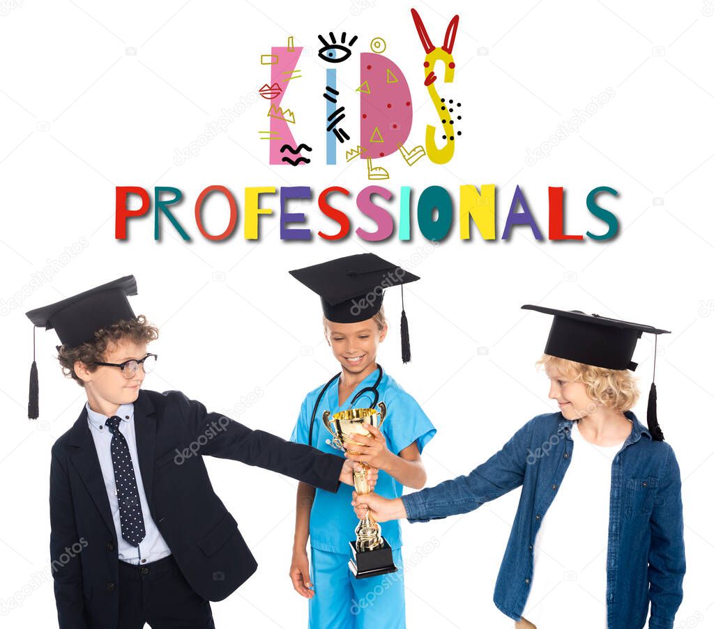 boys and girl in graduation caps dressed in costumes of different professions holding golden trophy near kids professionals lettering on white 