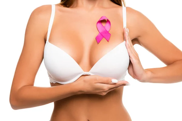 带有乳腺癌意识标志的女性被隔离在白色胸罩中触摸胸部的剪影 — 图库照片