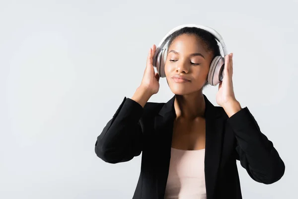 African American Businesswoman Listening Music Headphones Isolated Grey — Stock Photo, Image