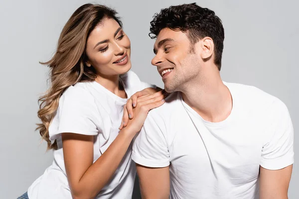 Happy Young Couple White Shirts Posing Isolated Grey — Stock Photo, Image