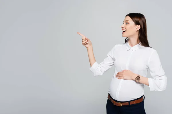 Smiling Young Pregnant Businesswoman Pointing Aside Isolated Grey — Stock Photo, Image