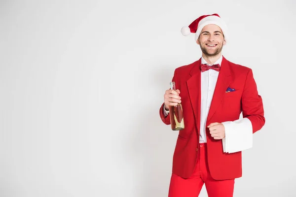 Cheerful Man Santa Hat Holding Bottle Champagne Towel Grey Background — Stock Photo, Image