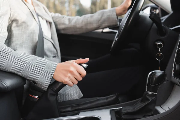 Partial View Businesswoman Shifting Hand Brake Lever While Steering Car — Stock Photo, Image