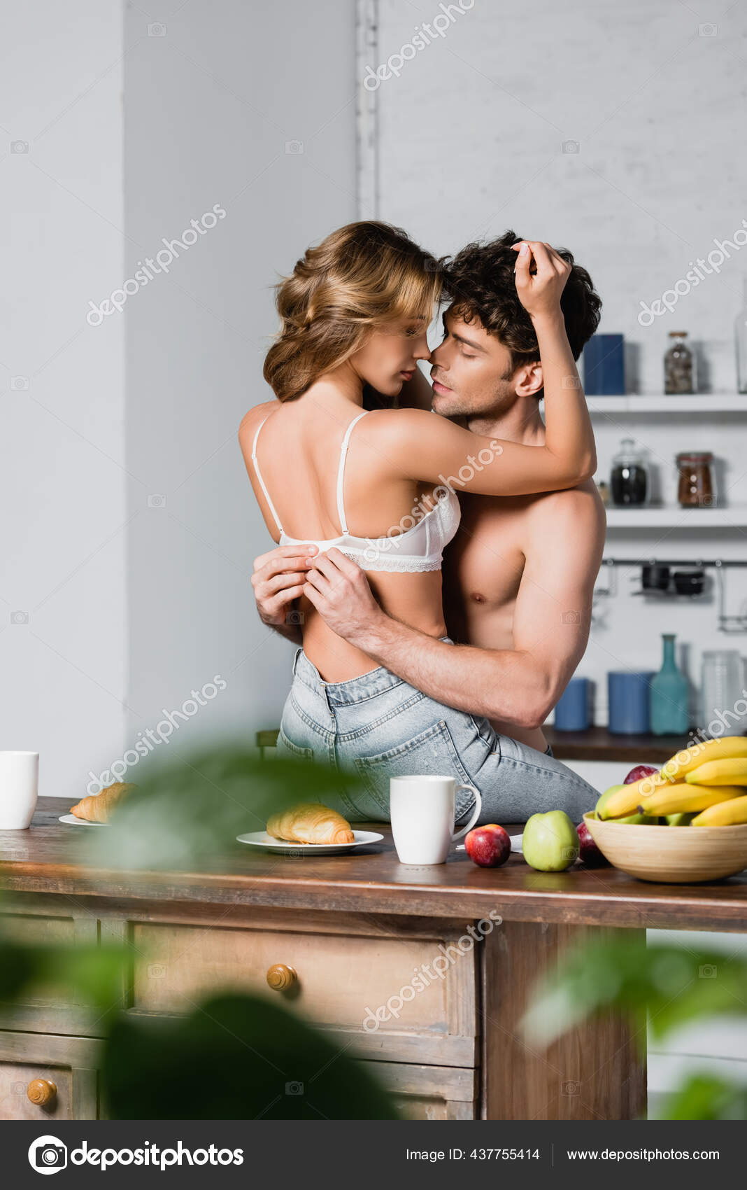Sexy Man Taking Bra Girlfriend Sitting Kitchen Table Breakfast Stock Photo by ©IgorVetushko 437755414 photo pic