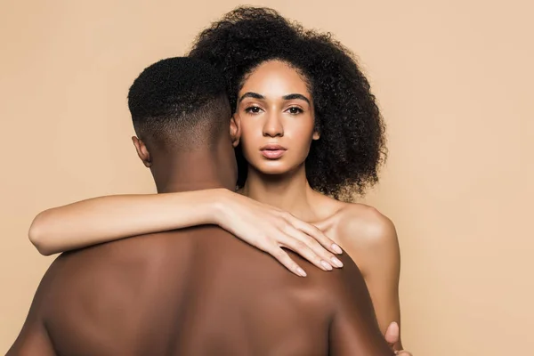 Curly African American Woman Embracing Boyfriend Isolated Beige — Stock Photo, Image