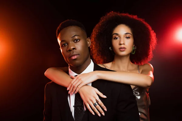 Curly African American Woman Dress Embracing Boyfriend Suit Black — Stock Photo, Image